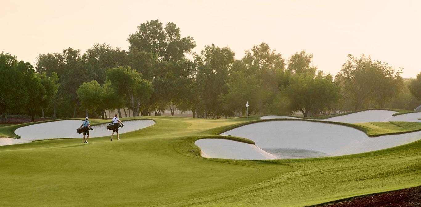 A smooth green surrounded by sand bunkers