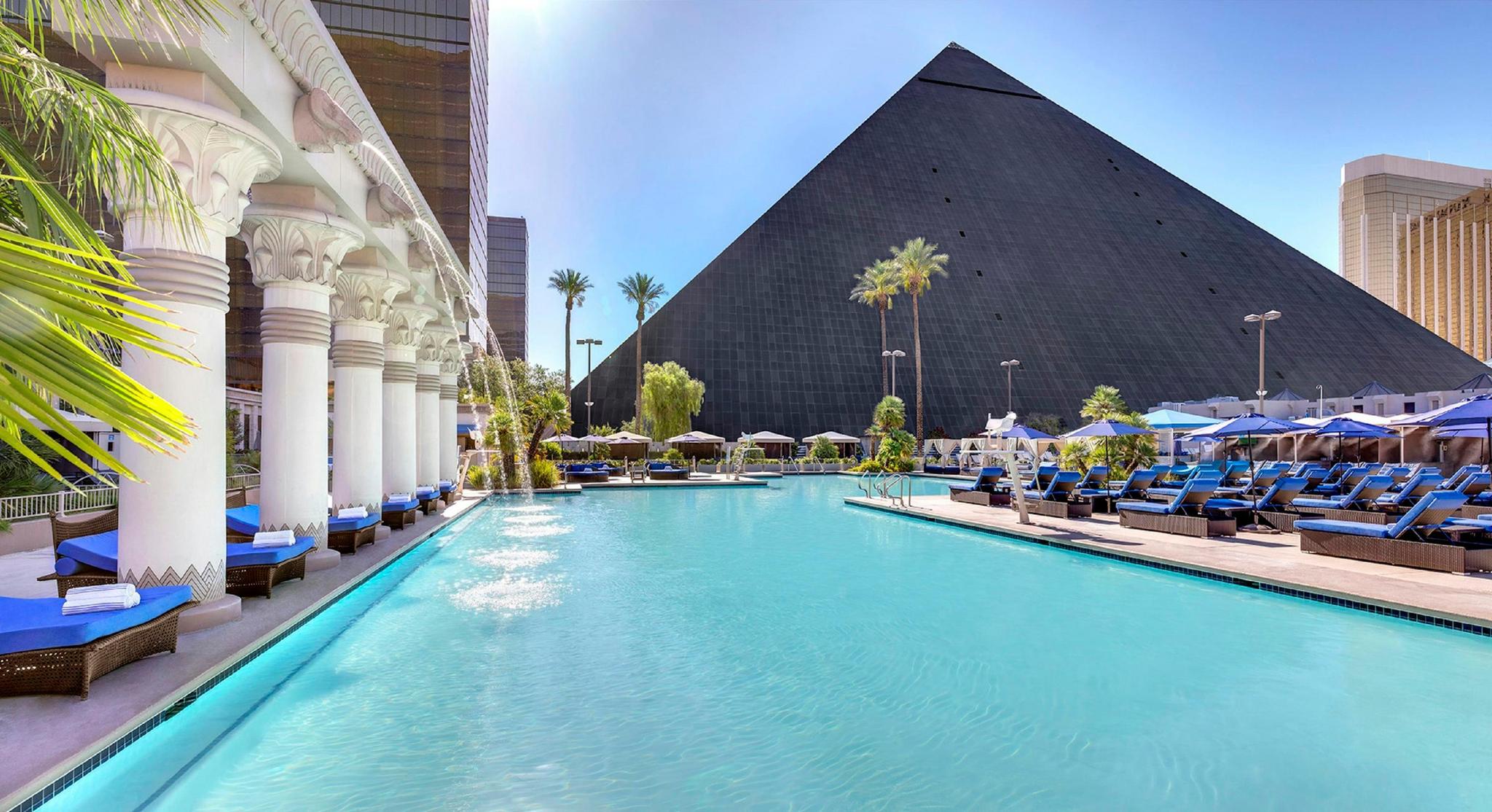Exterior view of The Luxor Casino & Resort next to the outdoor swimming pool