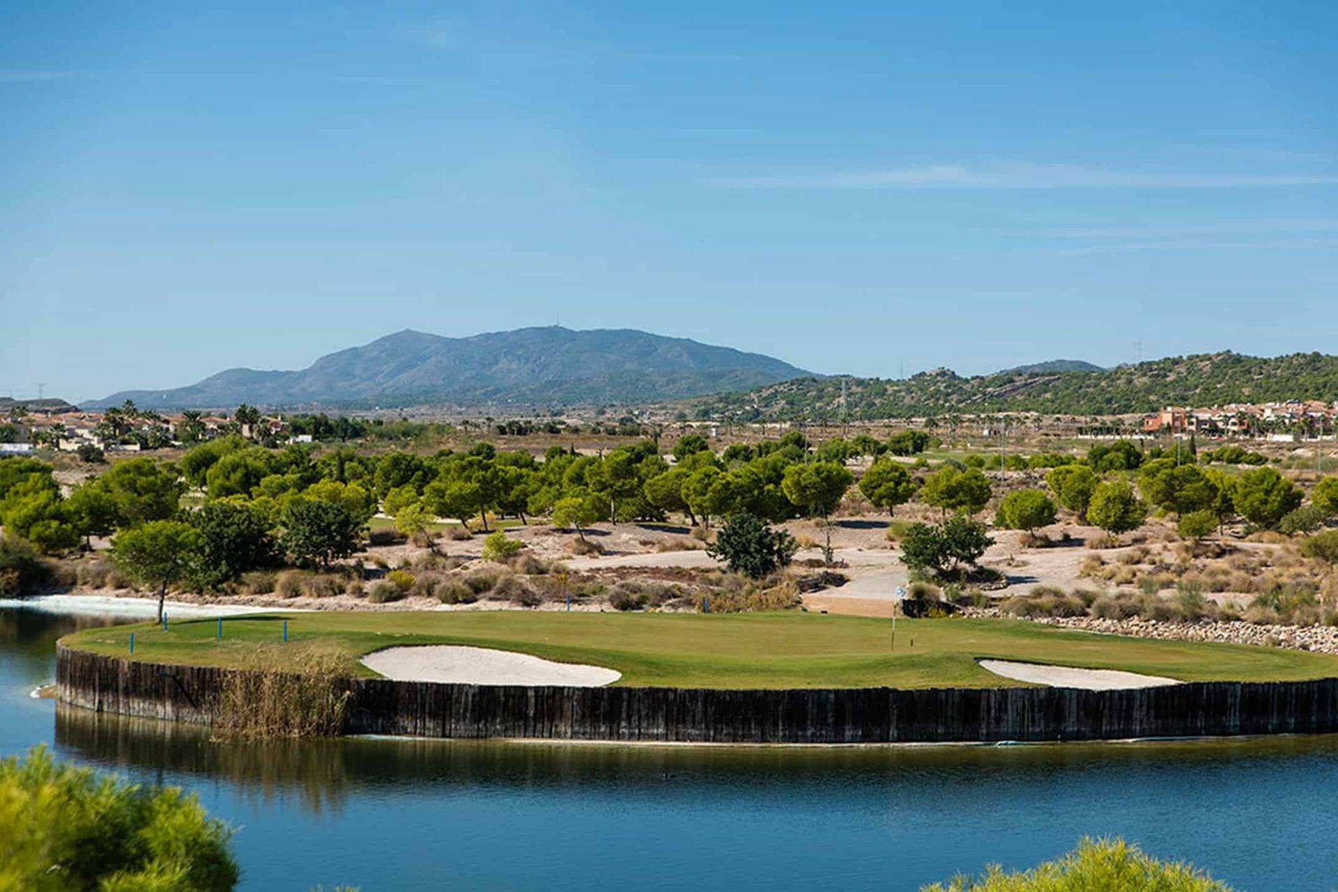 A smooth green surrounded by sand bunkers at Altaona Village