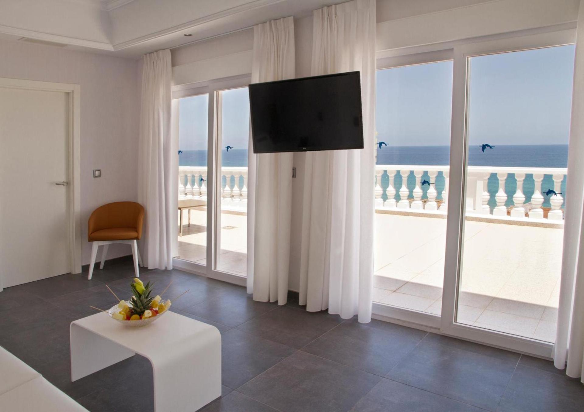 Room with balcony views at Delfines Hotel & Suites