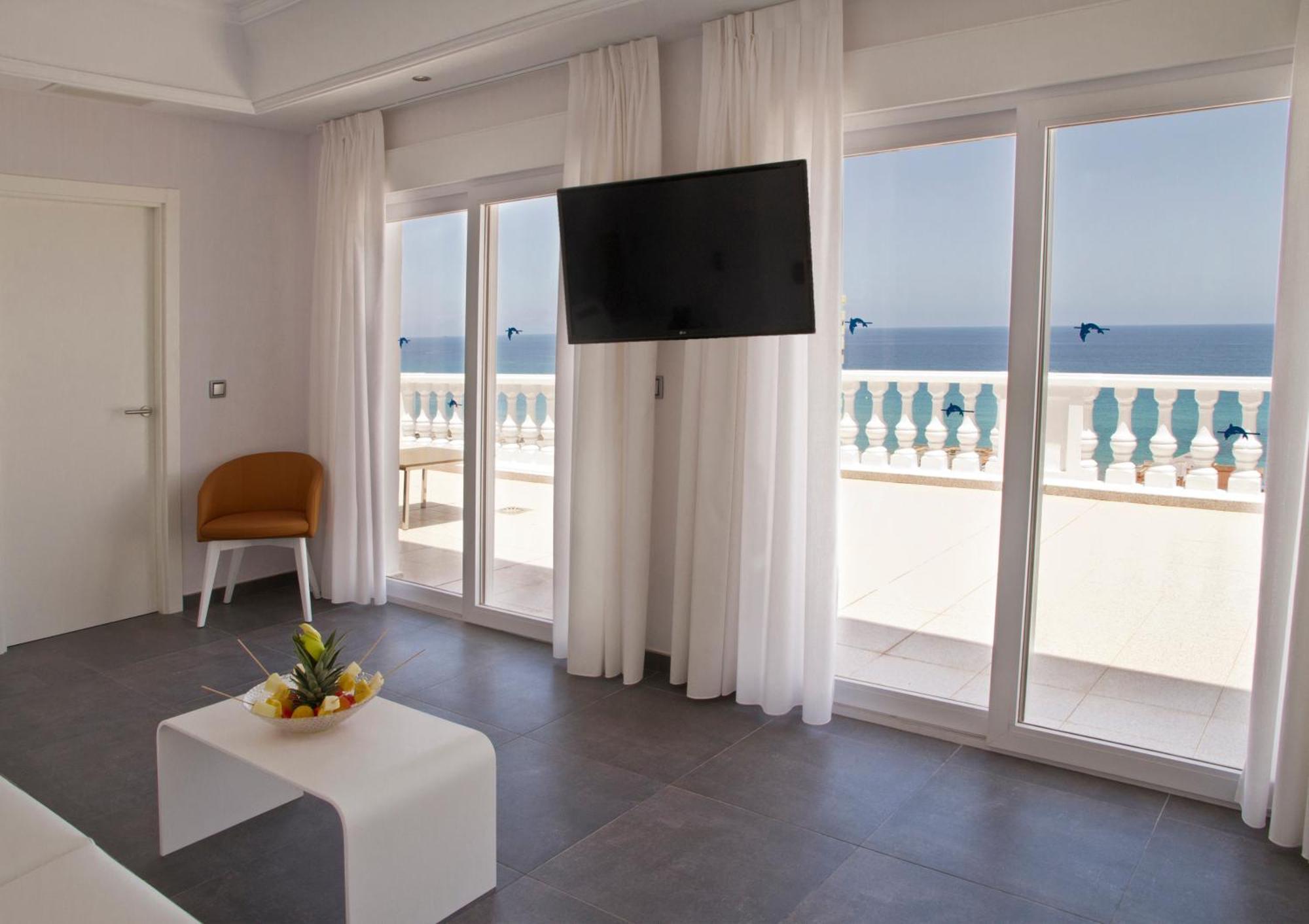 Room with balcony views at Delfines Hotel & Suites