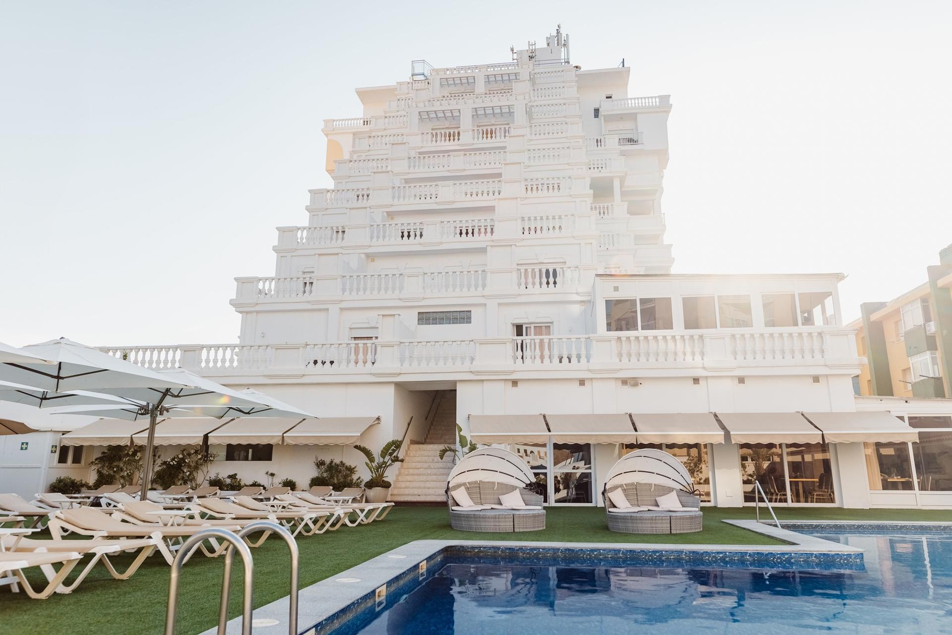 The Delfines Hotel & Suites Delfines Hotel & Suites building overlooking the outdoor swimming pool