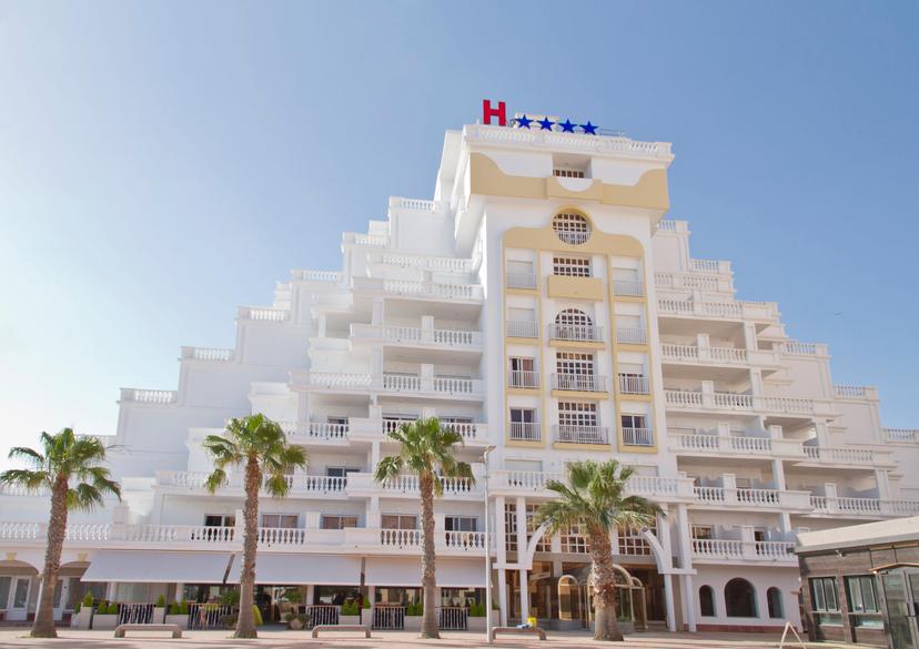 Panoramic view of the Delfines Hotel & Suites building
