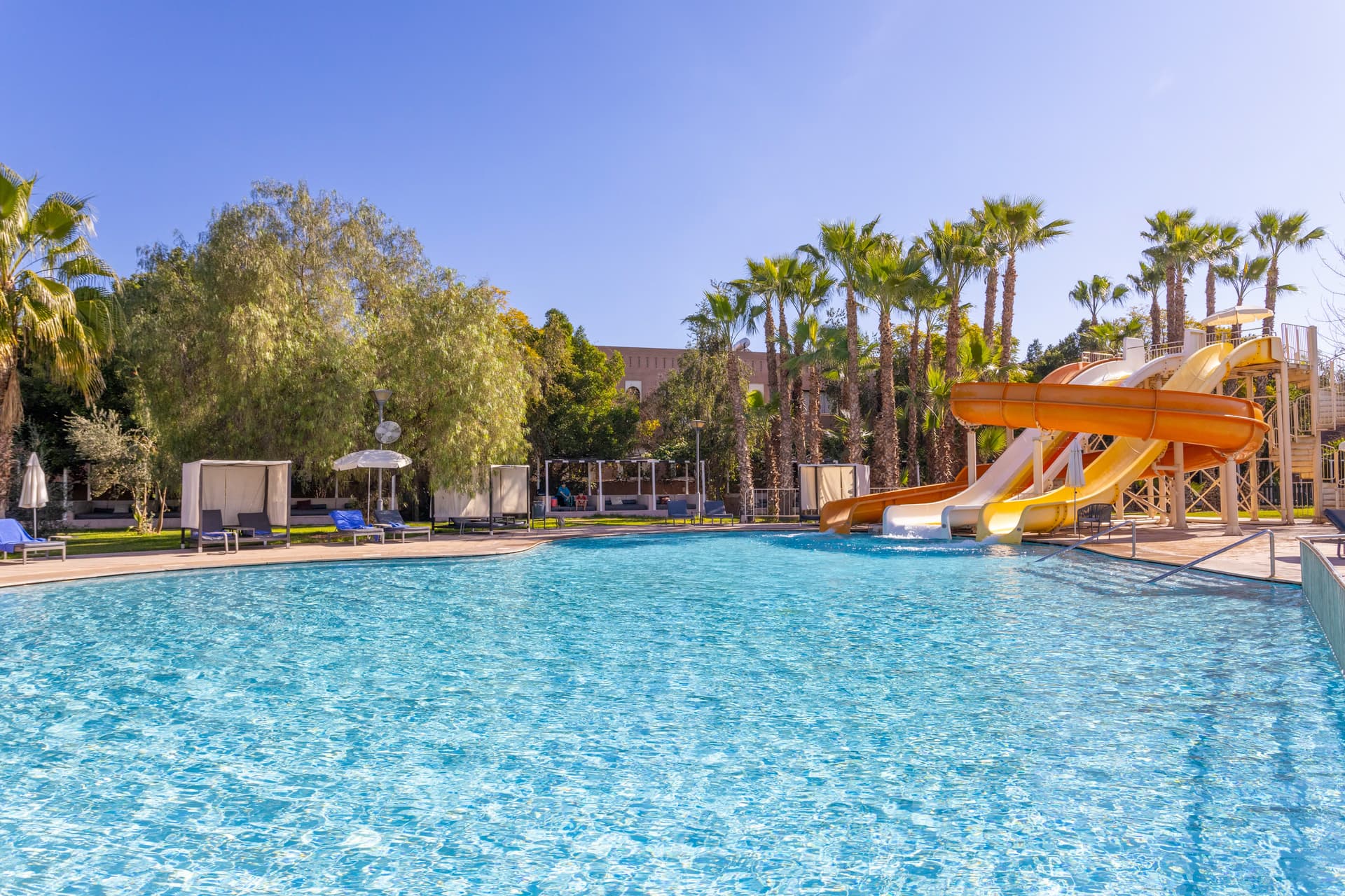 Outdoor swimming pool with water slides