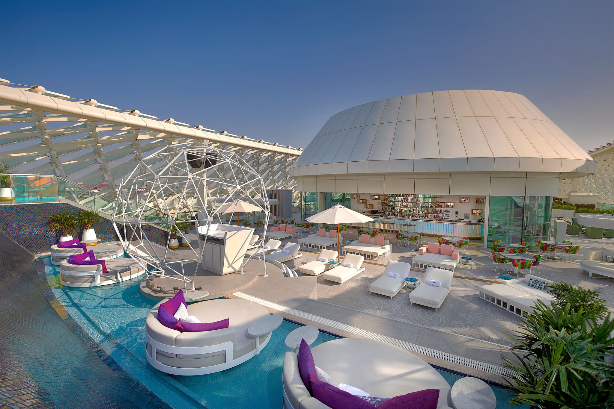 Panoramic view of the W Abu Dhabi - Yas Island outdoor swimming pool