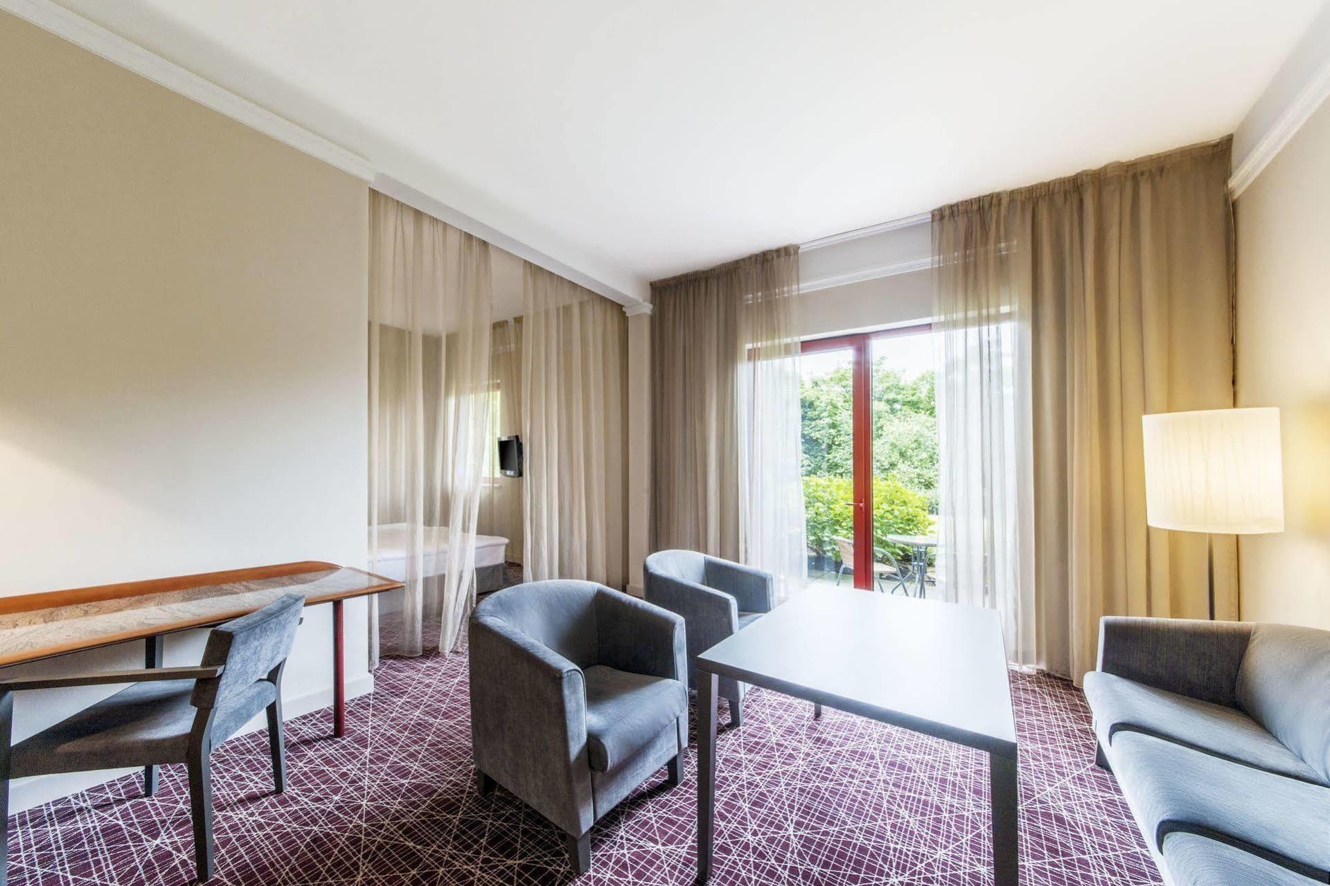 Living room as part of a suite at Hotel NH Prague City