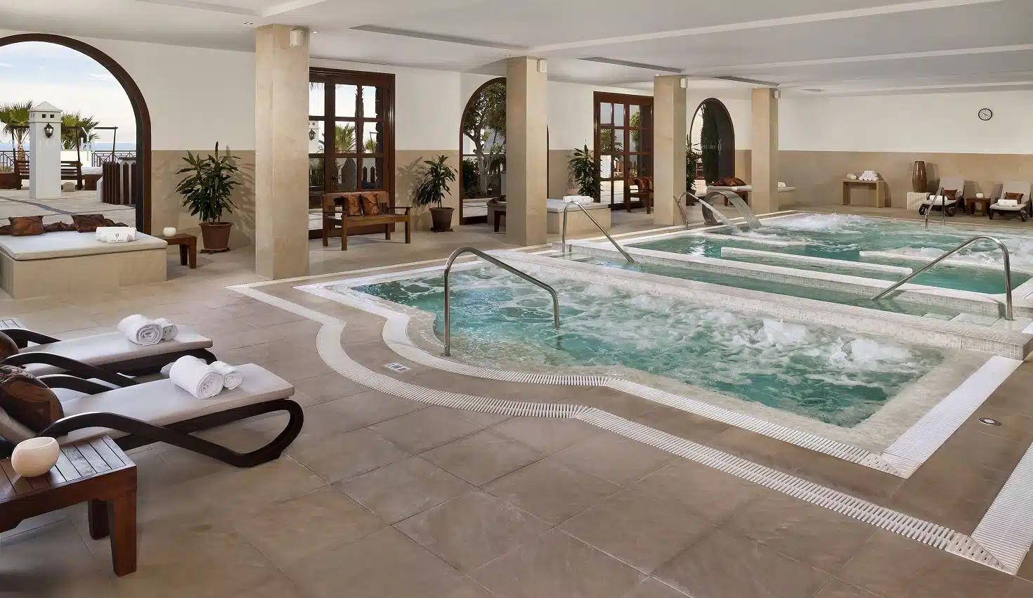 Indoor pools as part of the spa facilities at Melia Hacienda Del Conde