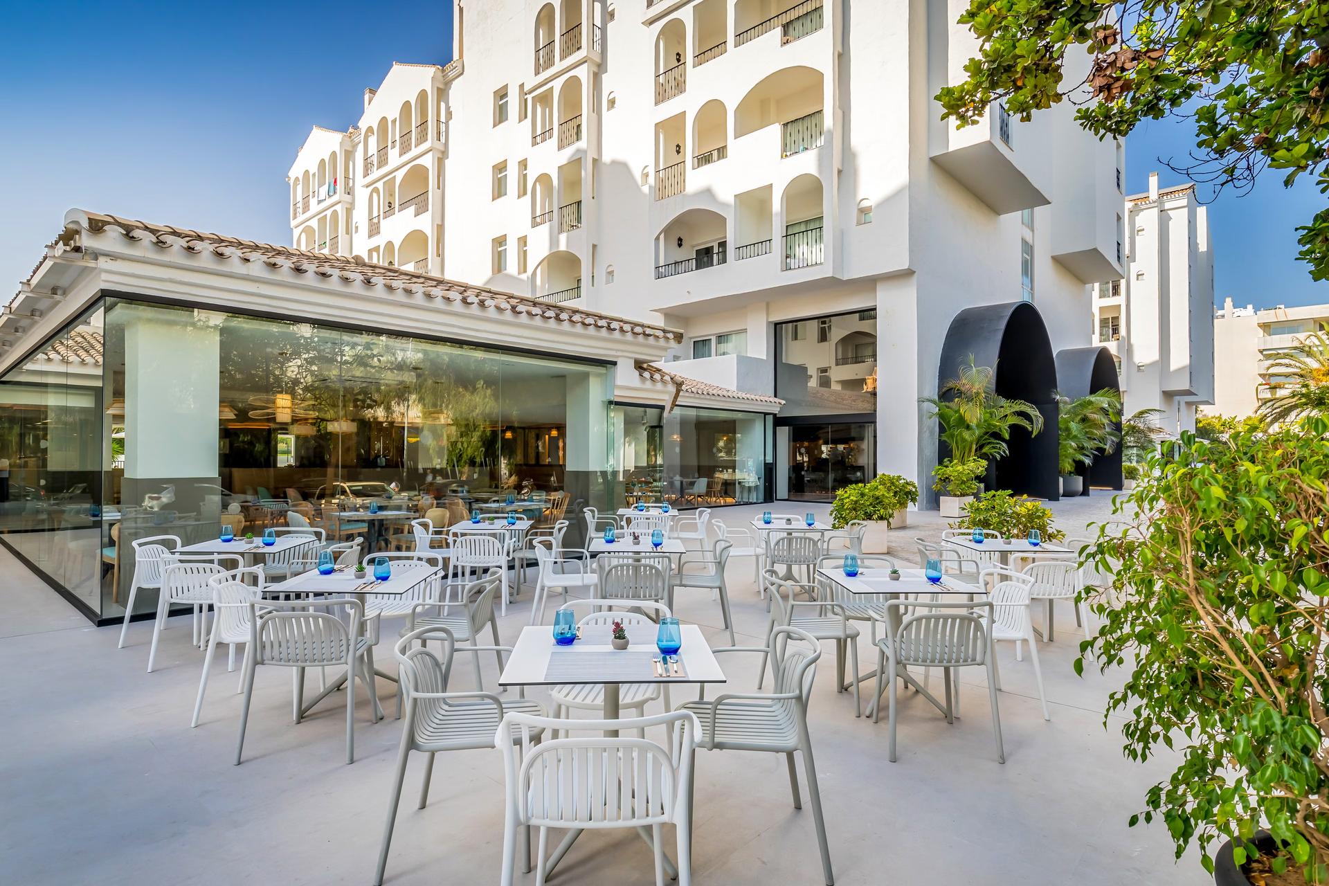 Outdoor lounging area at Occidental Puerto Banus