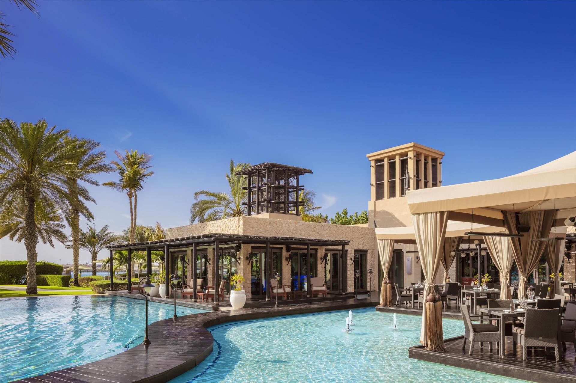 Outdoor swimming pool outside the One&Only Royal Mirage