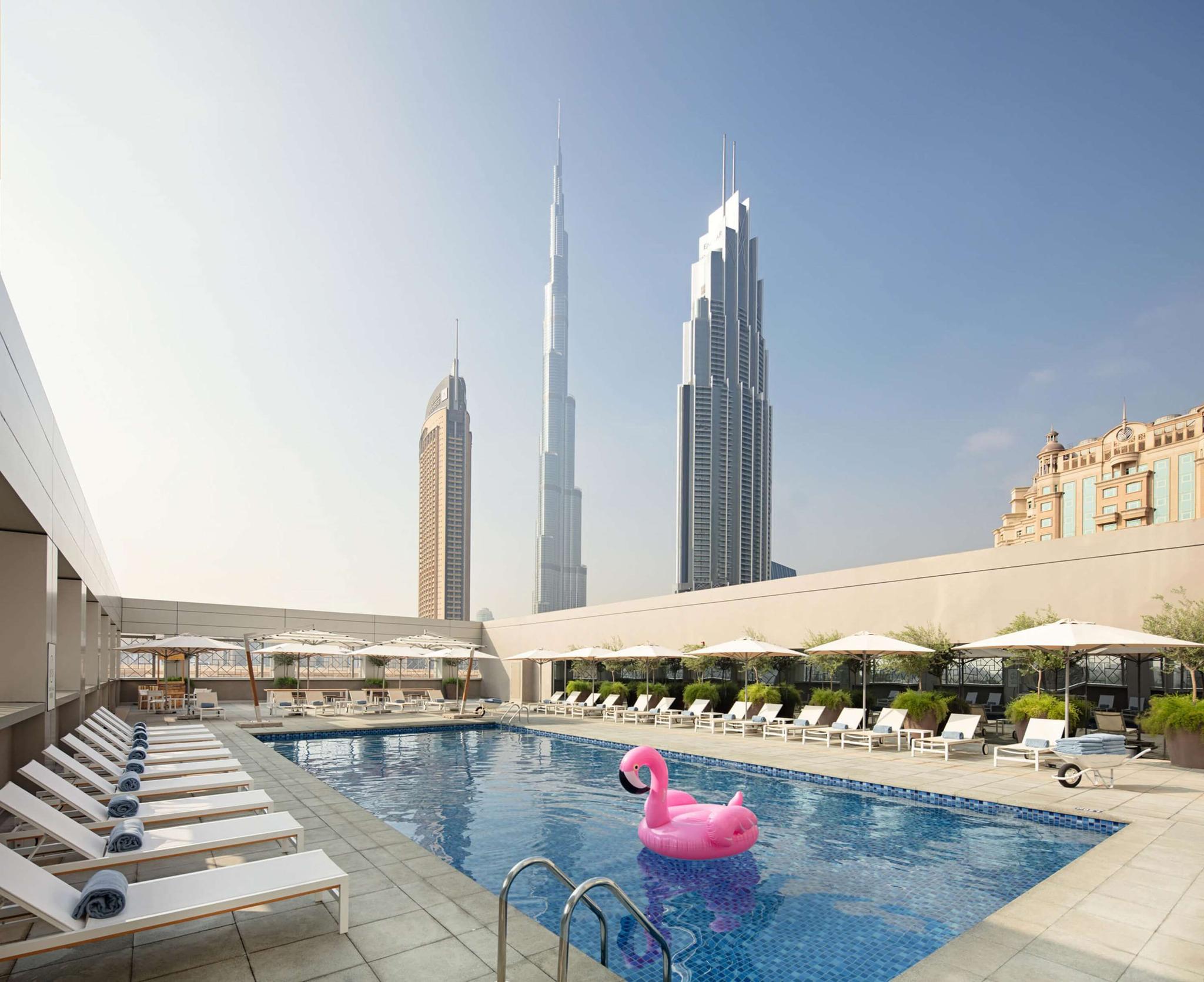 Rooftop pool with views of the burj khalifa