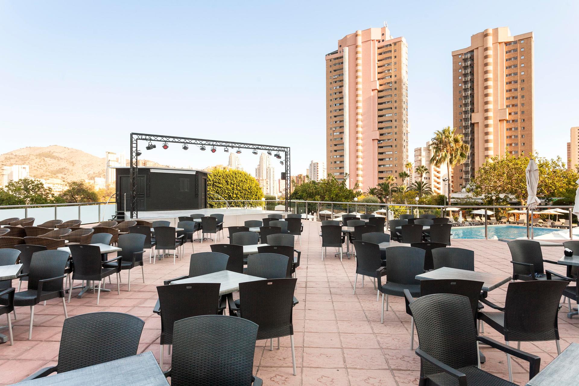 Outdoor seating as part of the entertainment section at Sandos Benidorm Suites