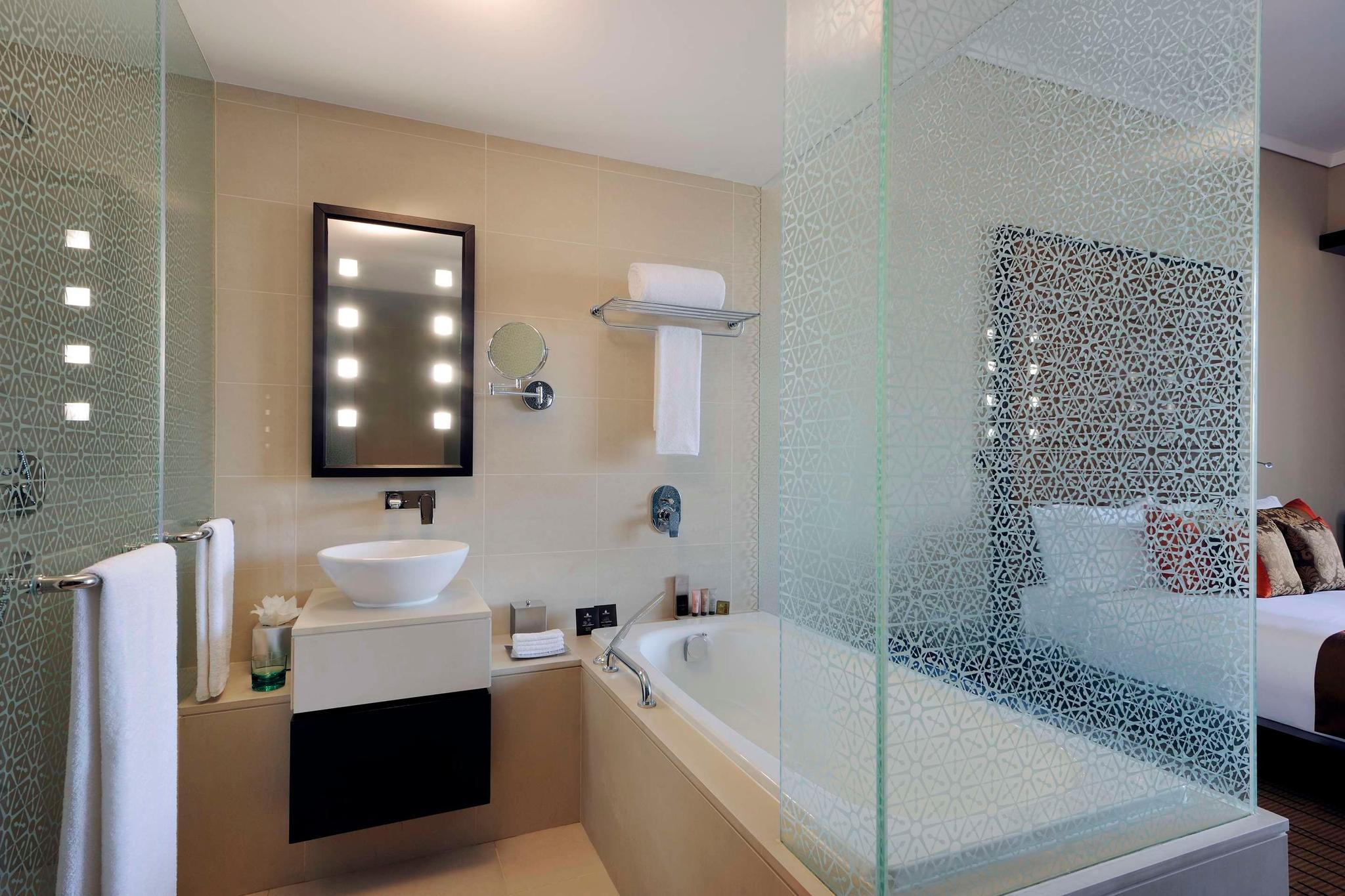 Open plan bathroom as part of a double bed suite at Southern Sun - Abu Dhabi