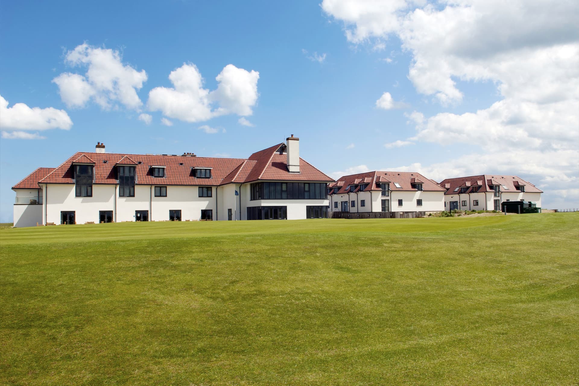 Panoramic view of the Prince's Golf Club building overlooking the course