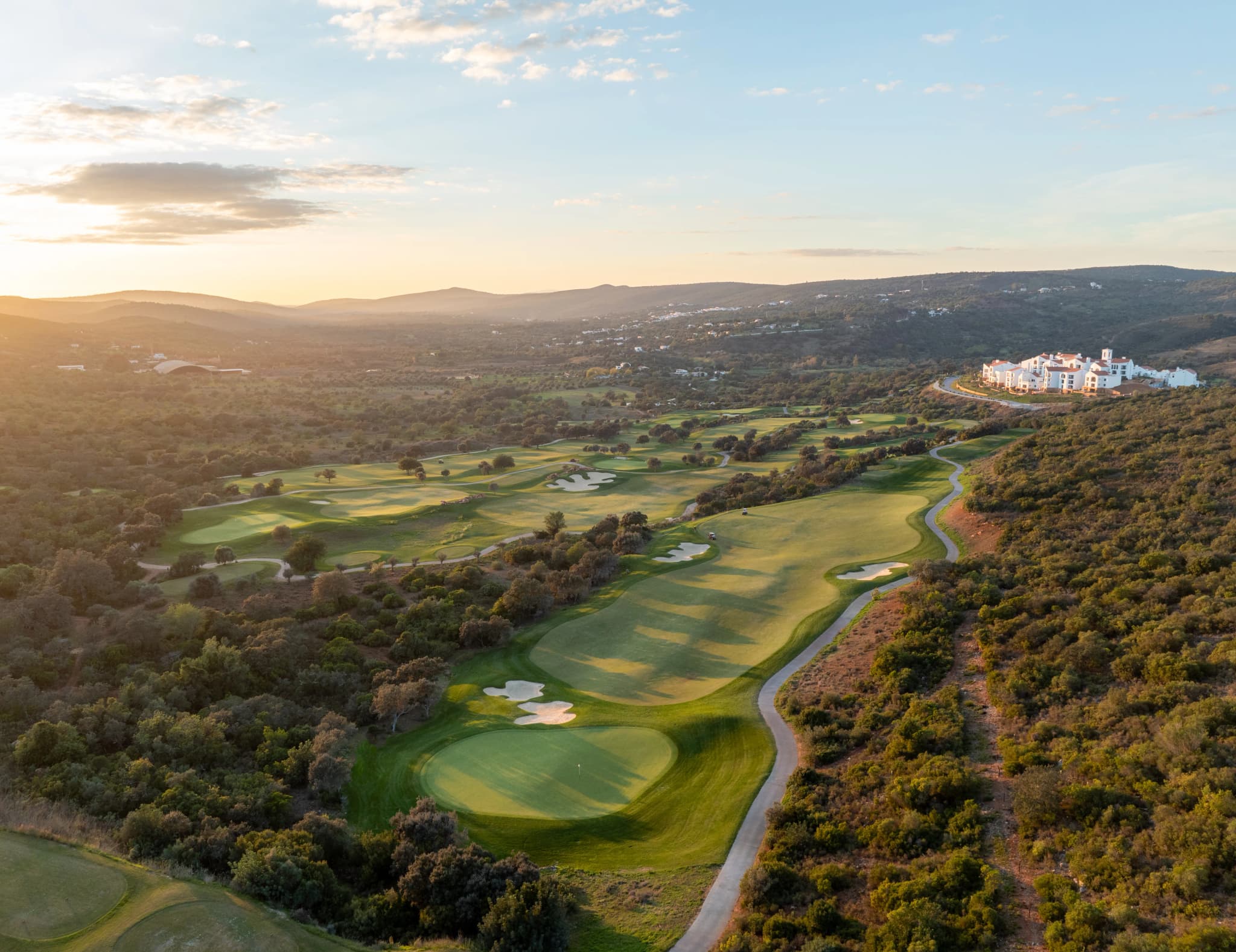 Overhead view of a well maintained leading to a smooth green
