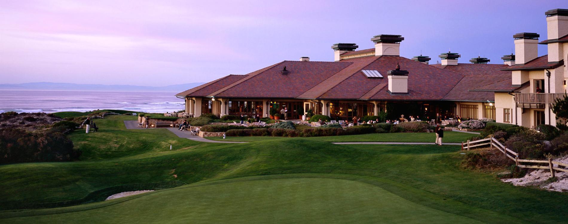 Panoramic view of The Inn at Spanish Bay & Pebble Beach clubhouse overlooking the course