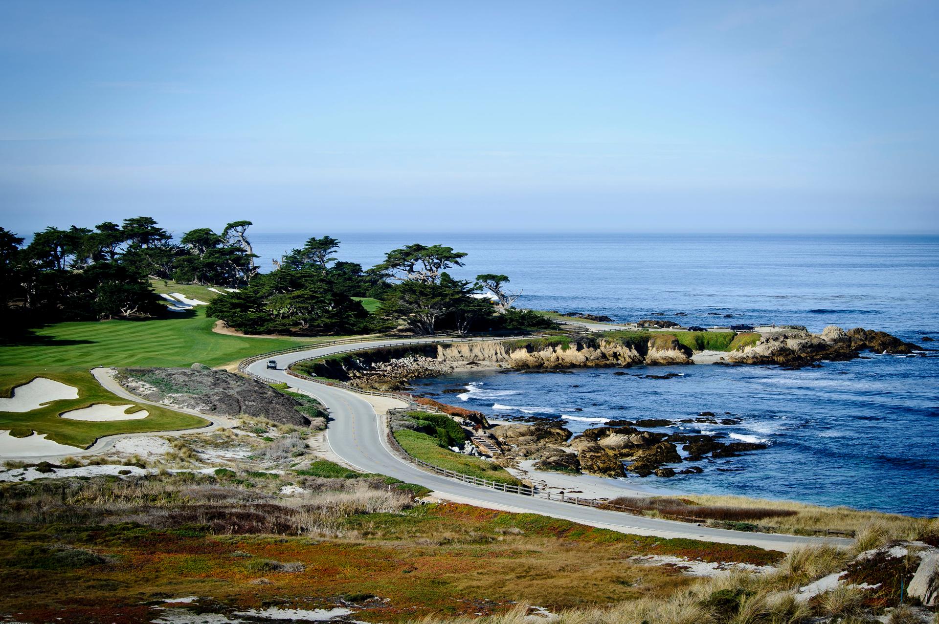 Overhead view of a road separating the course from the coast