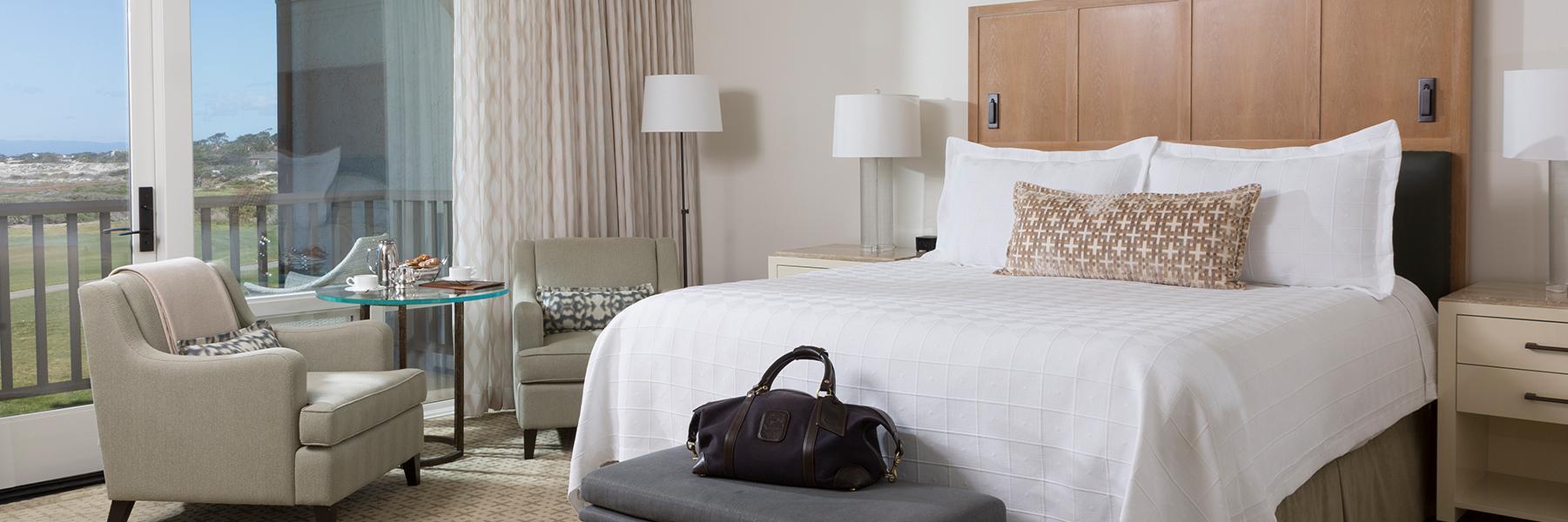 Double bed room with balcony view of the course