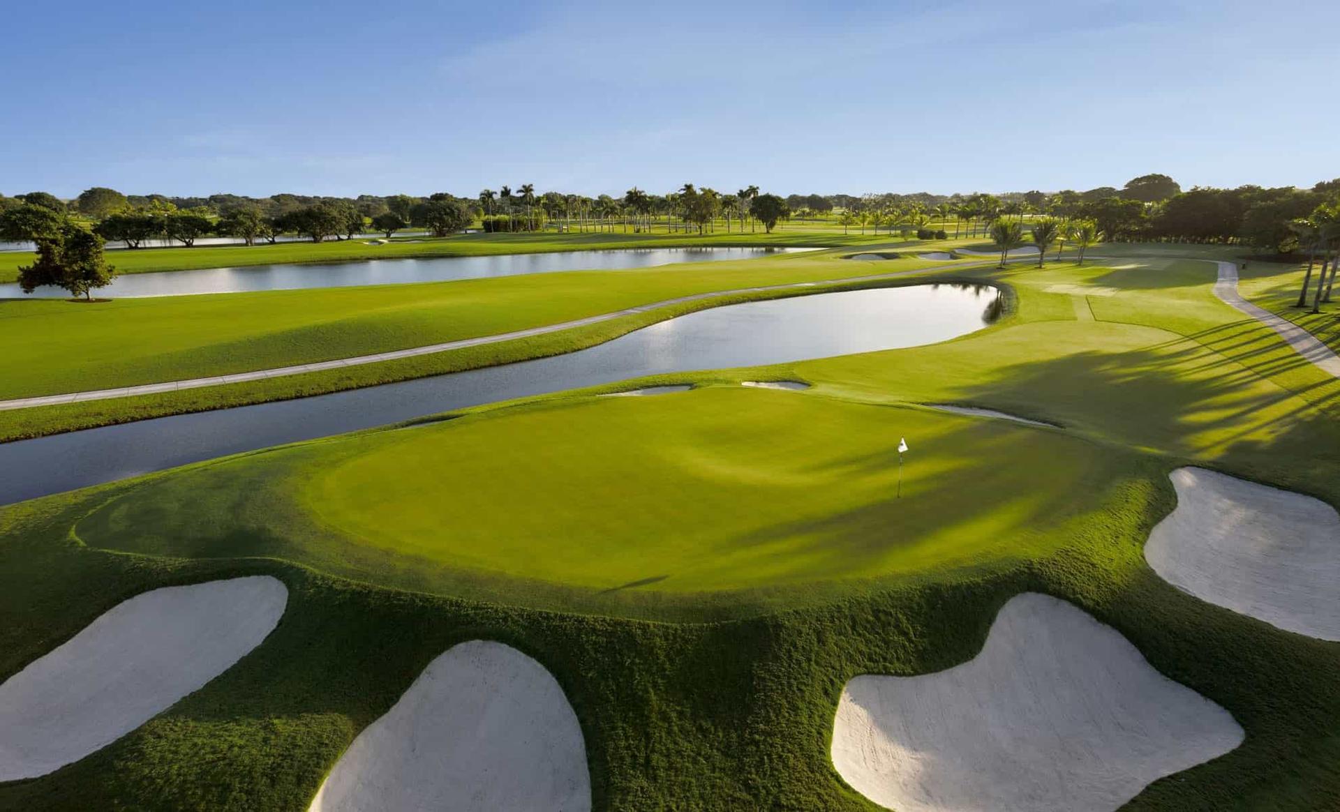 An elevated green surrounded by sand bunkers