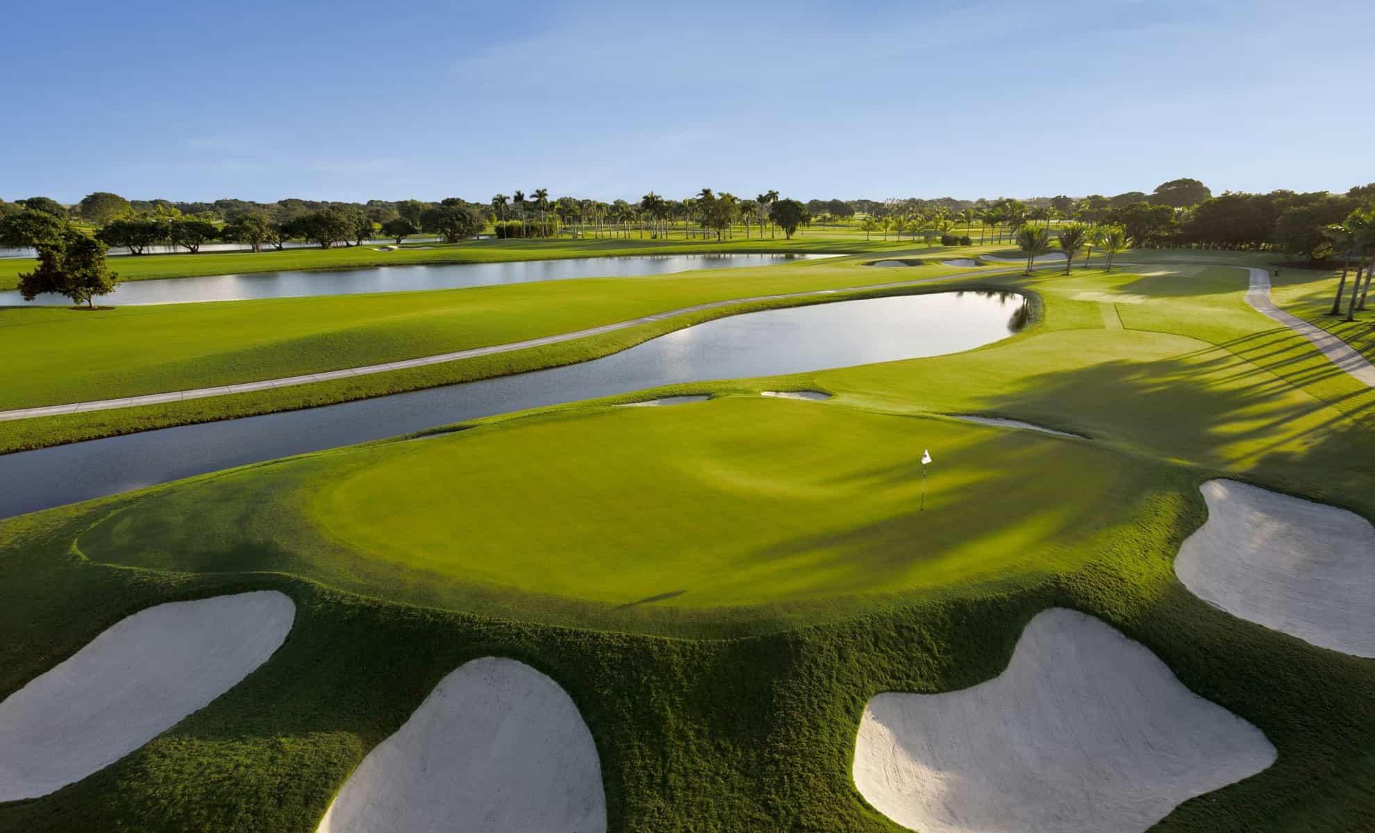 An elevated green surrounded by sand bunkers