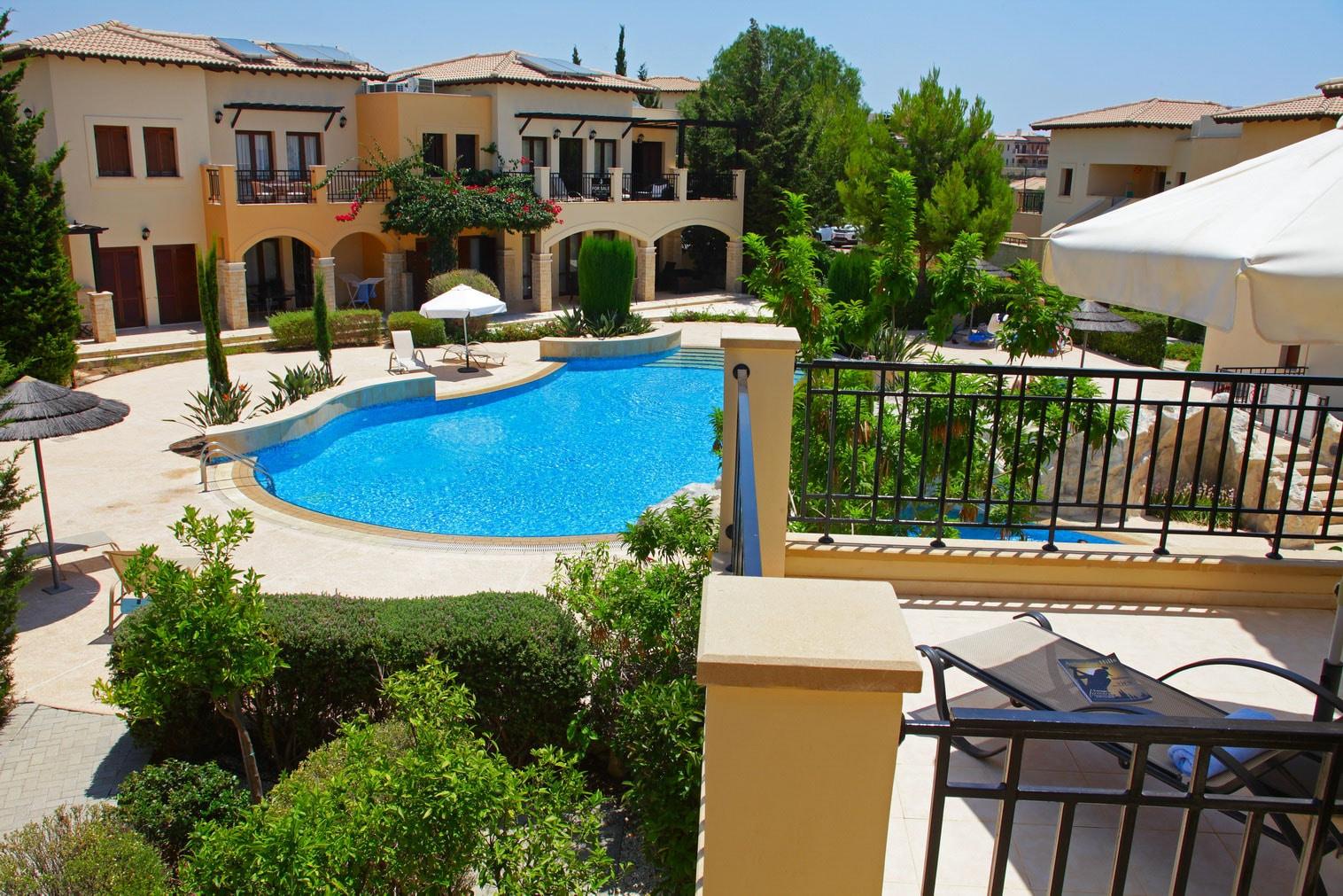 Overhead view of an outdoor swimming pool at Aphrodite Hills Resort