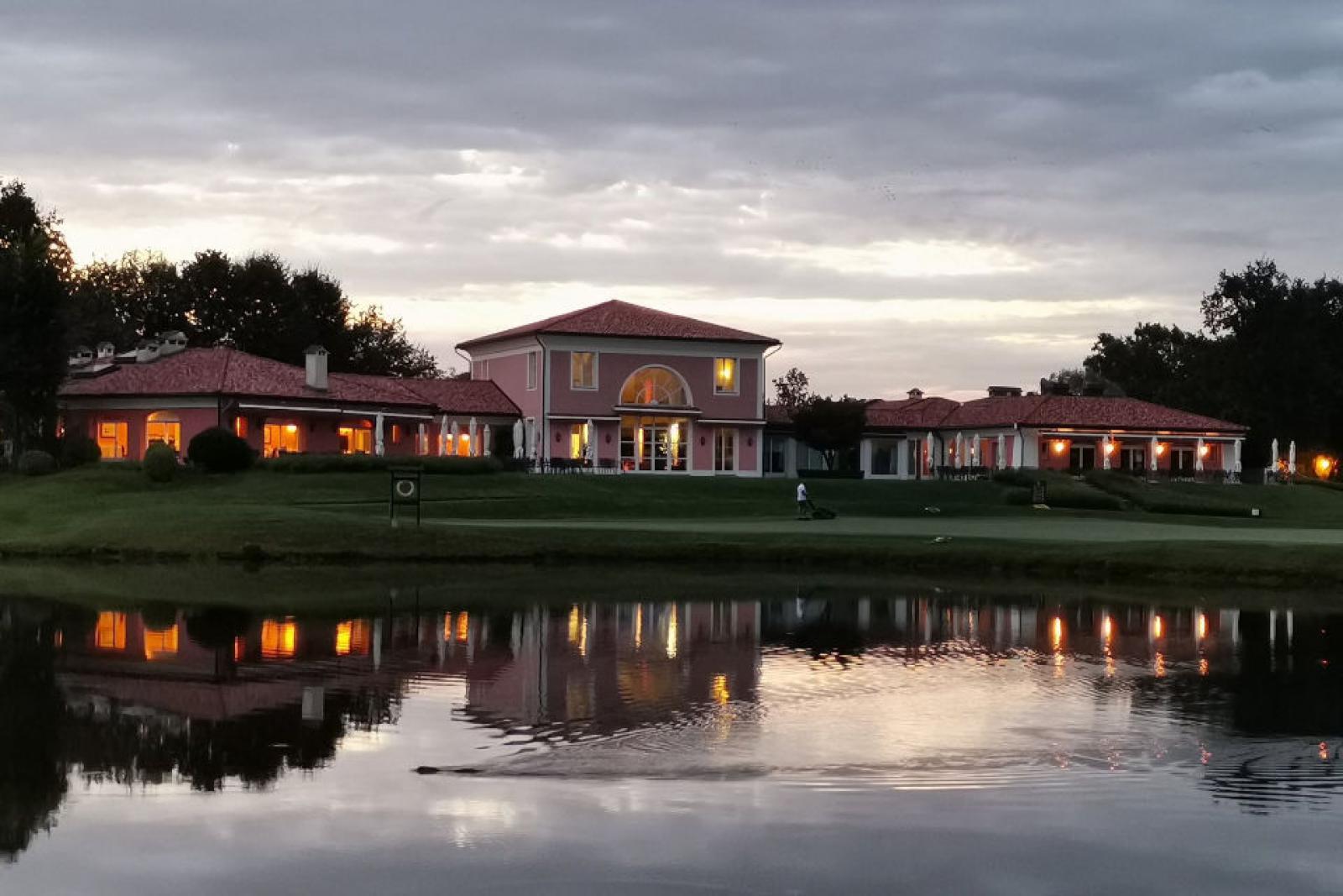 Panoramic view of the Bogogno Golf Resort building overlooking the golf course