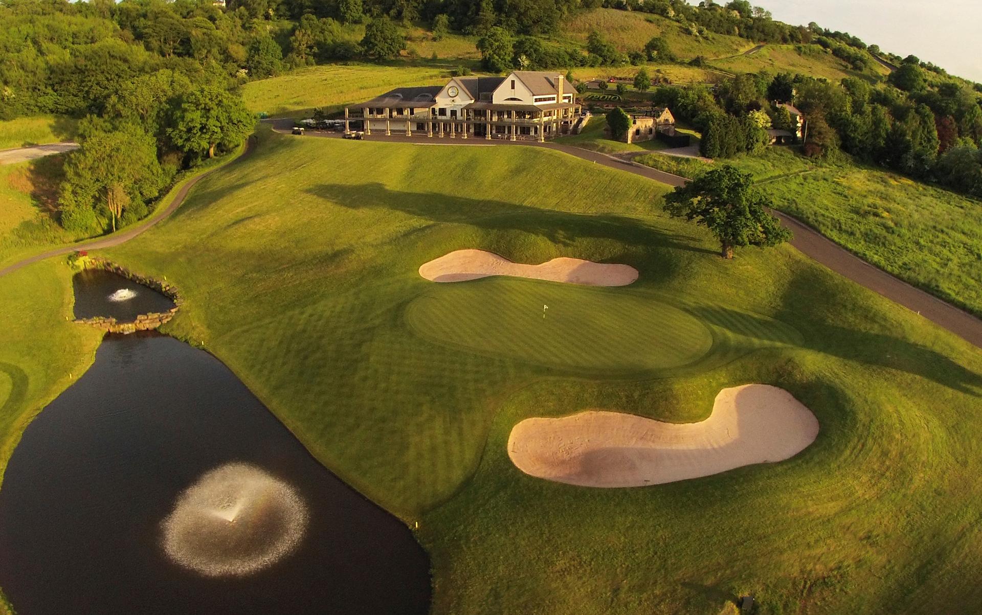 Overhead view of a well maintained fairway with sand bunkers