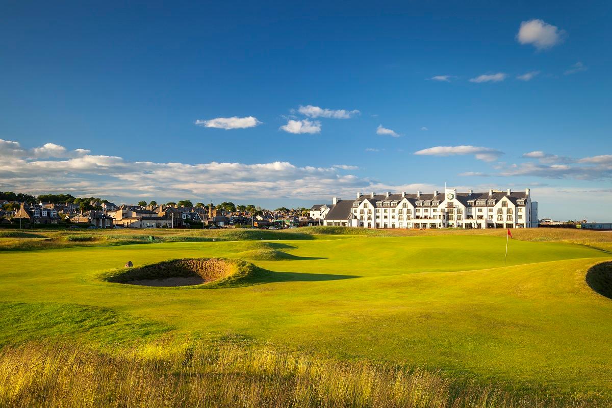 Fairway nestled with sand bunkers with the Carnoustie Resort in the background