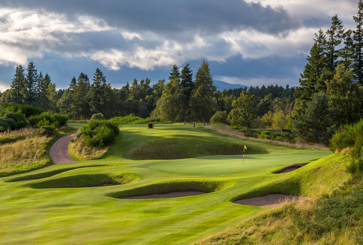 A well maintained fairway nestled with sand bunkers at Gleneagles