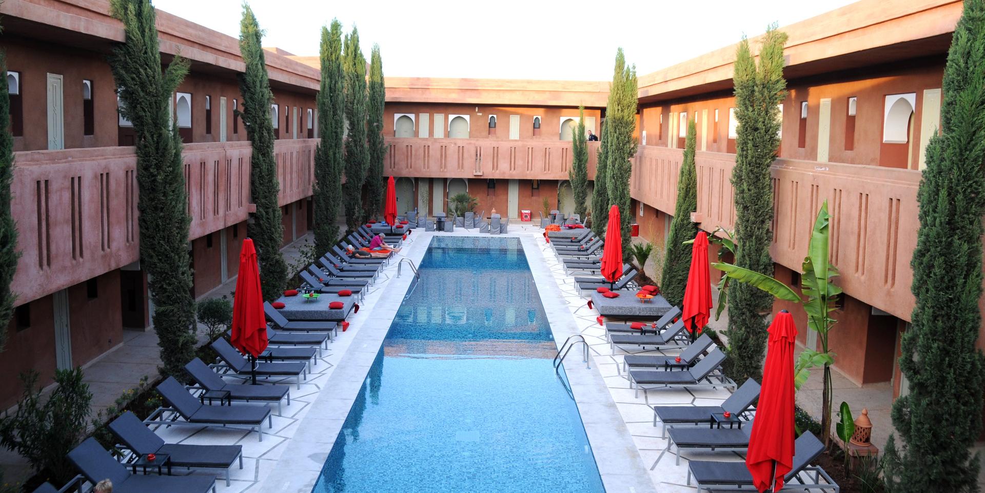 Panoramic view of the outdoor swimming pool at Kenzi Club Agdal Medina