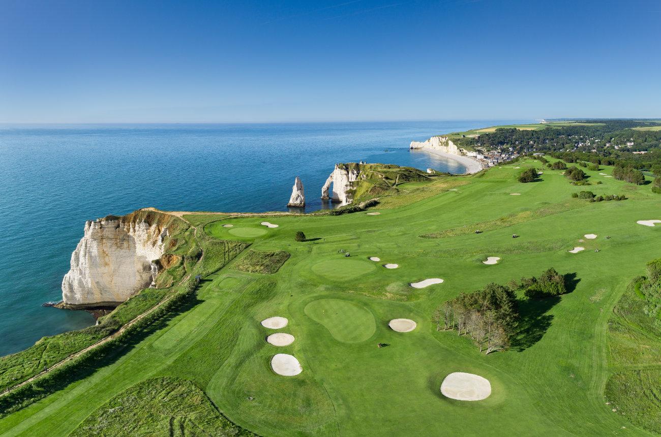 Overhead view of a coastal fairway nestled with sand bunkers