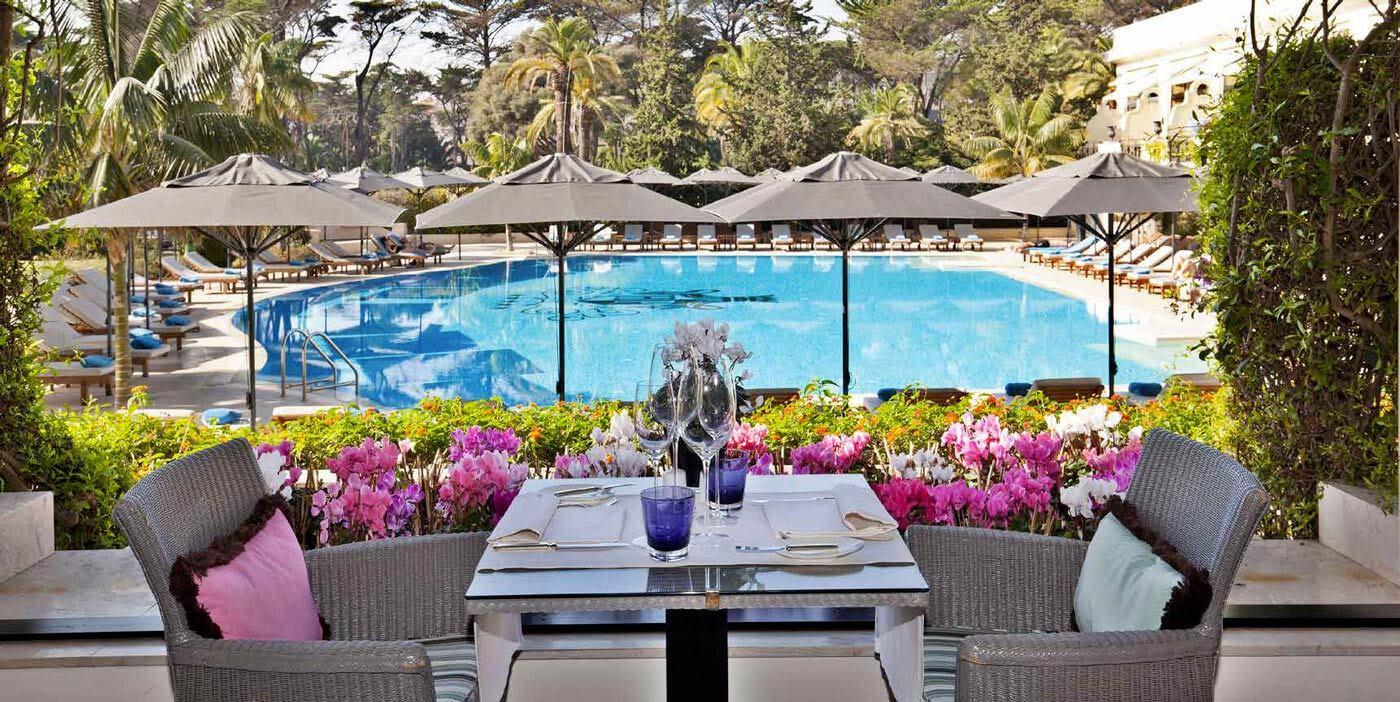 Poolside dining at the Palacio Estoril Golf & Spa Hotel