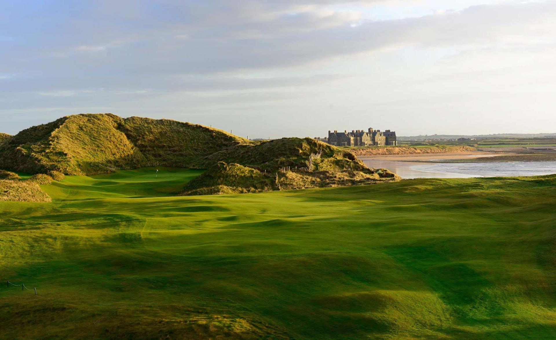 A smooth green surrounded by a rocky rough