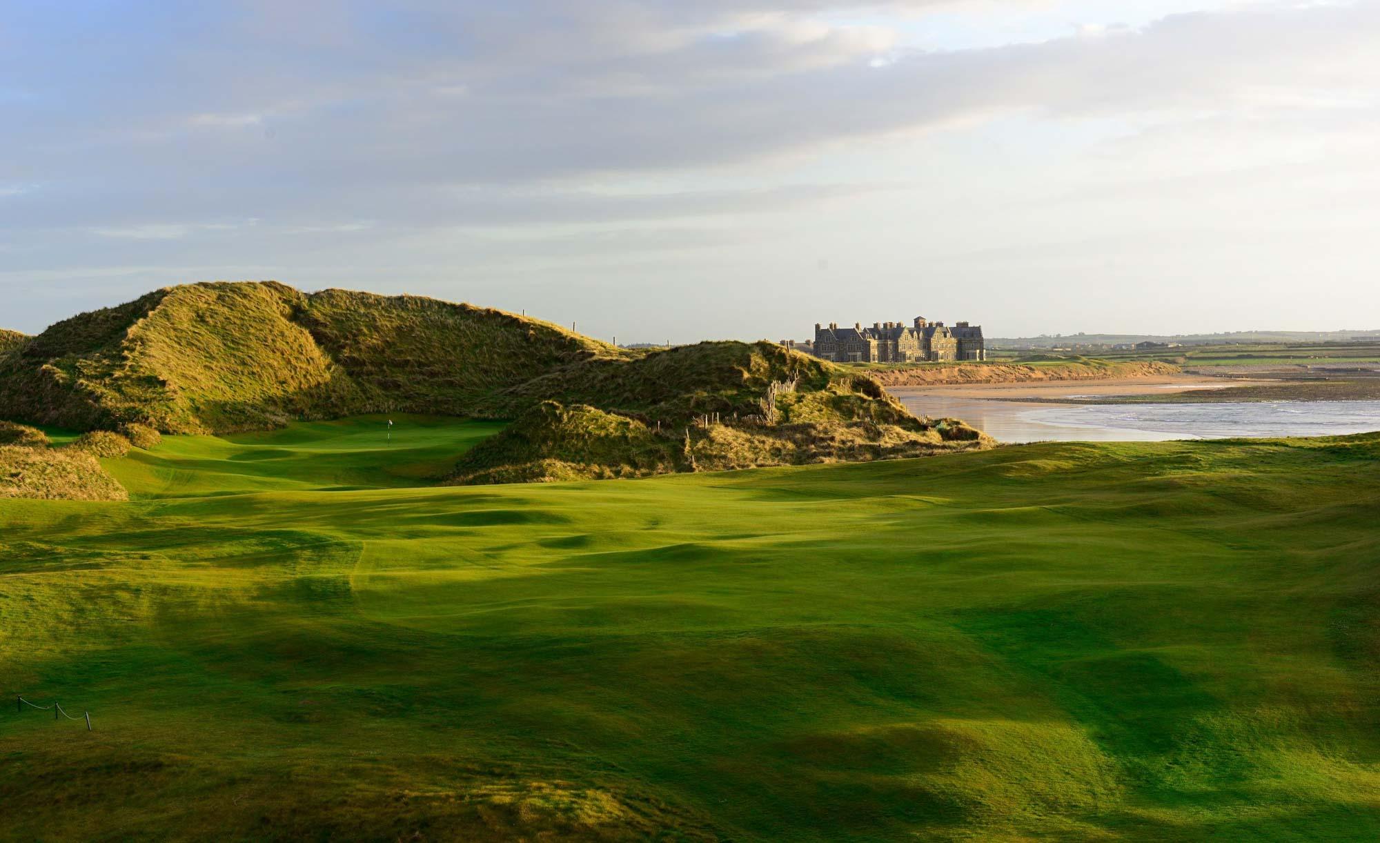 A smooth green surrounded by a rocky rough