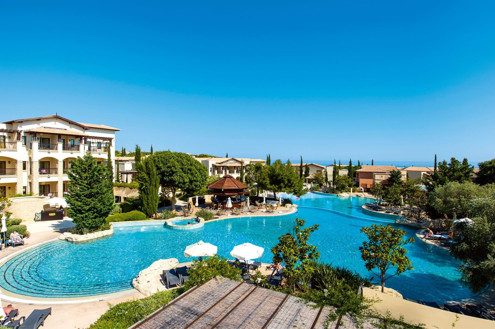 Overhead view of an outdoor swimming pool at Aphrodite Hills Resort
