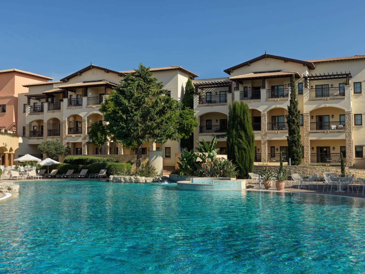 Panoramic view of the Aphrodite Hills hotel overlooking outdoor pool