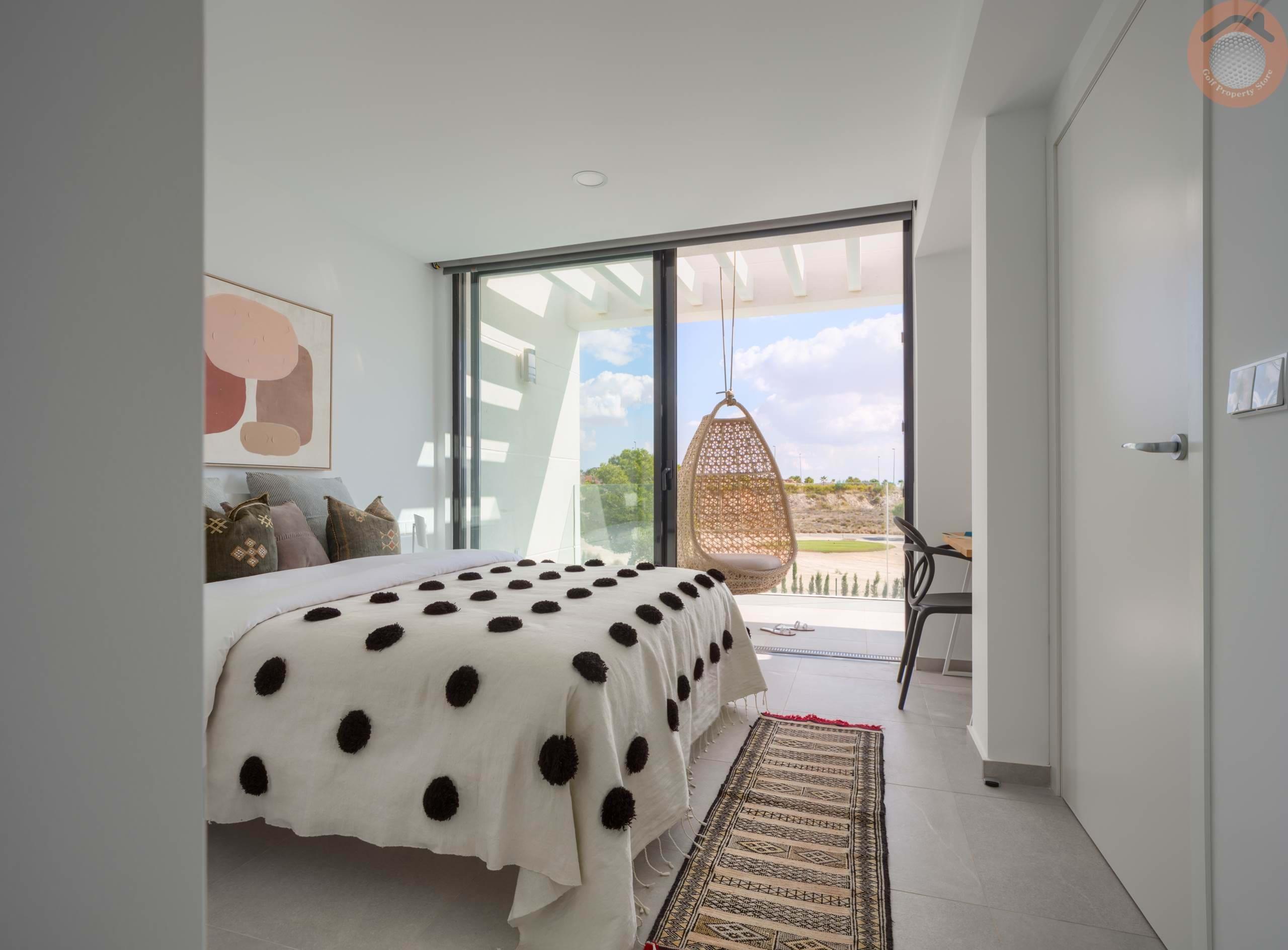 Double bed room with patio space as part of a villa at Altaona Village