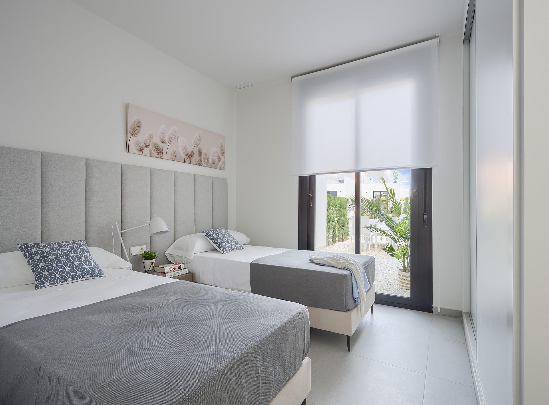 Twin bed room as part of a villa at Altaona Village