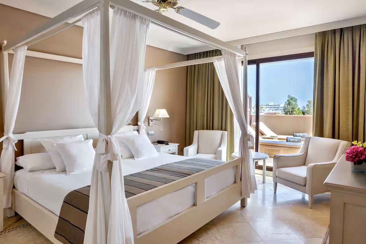 Double bed suite with balcony views at Barcelo Marbella Hotel