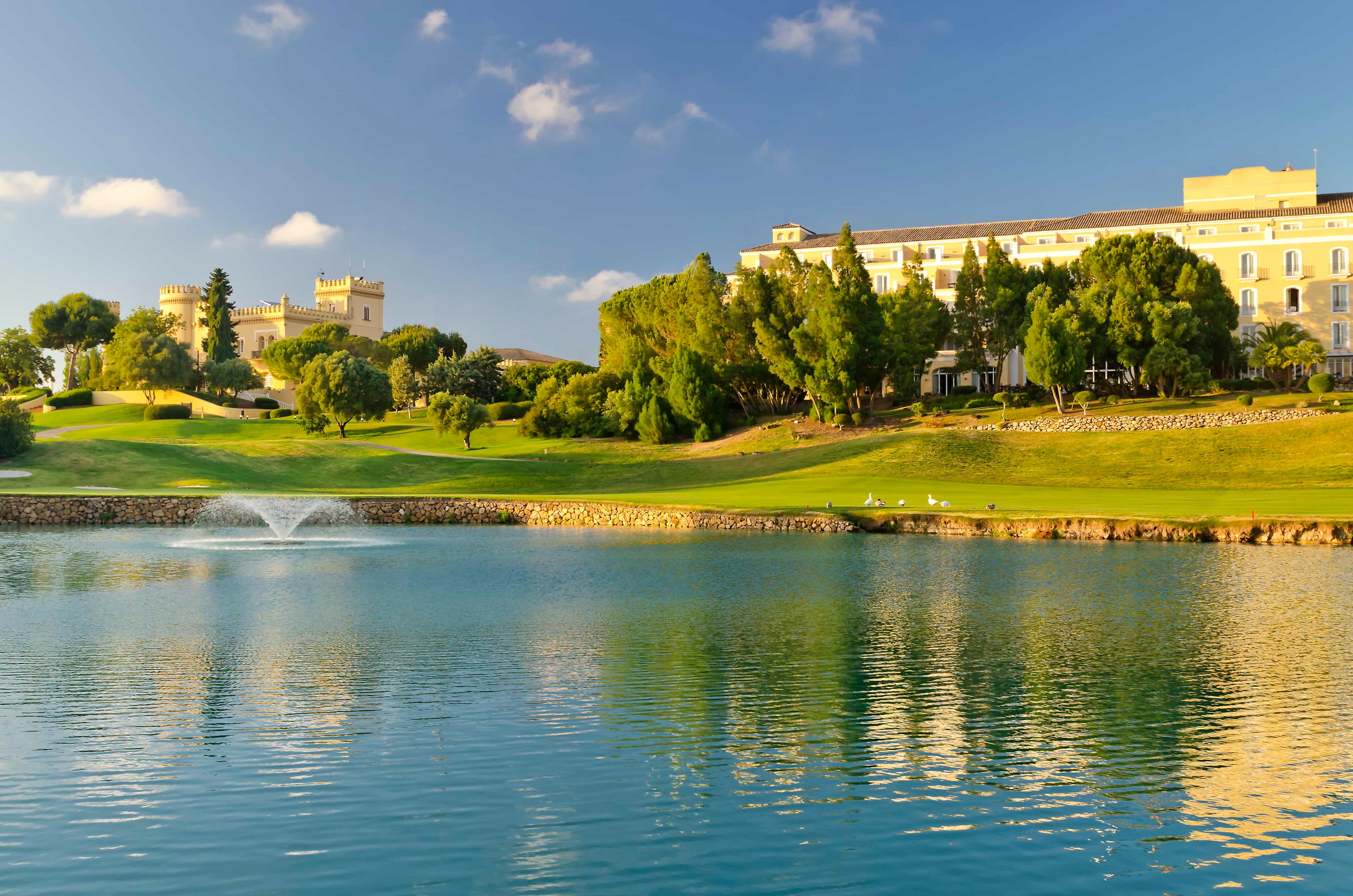 Water hazard (foreground) with the clubhouse and hotel in the background