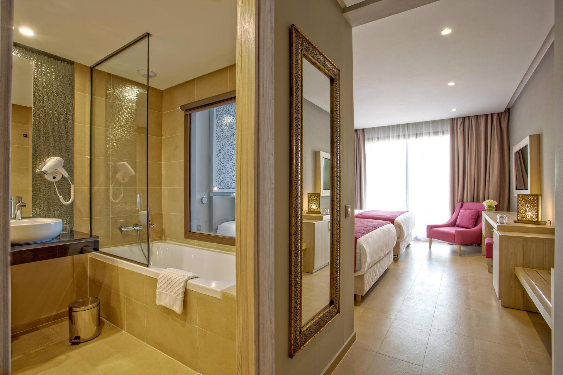 Bathroom and double bed room at the Be Live Collection