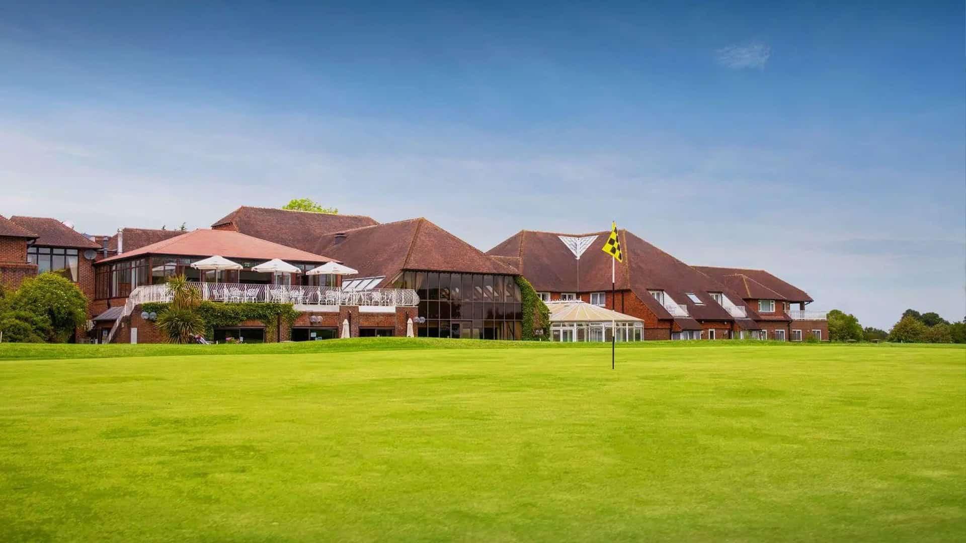 Smooth green with the resort behind