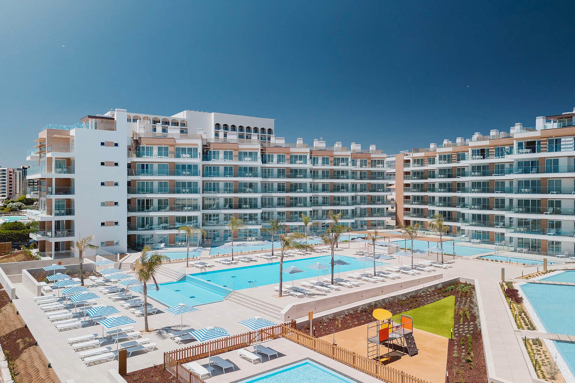 Panoramic view of the Dom Pedro Residences overlooking the outdoor swimming pools