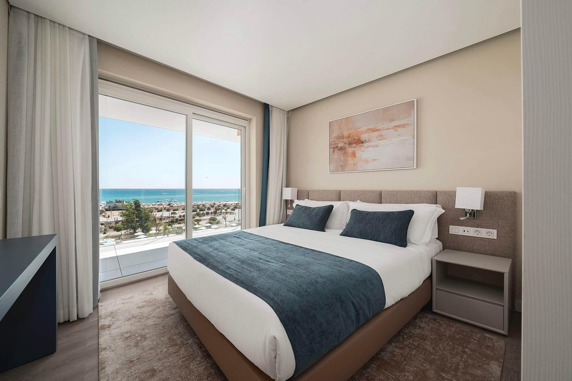 Double bed suite at the Dom Pedro Residences with beach views