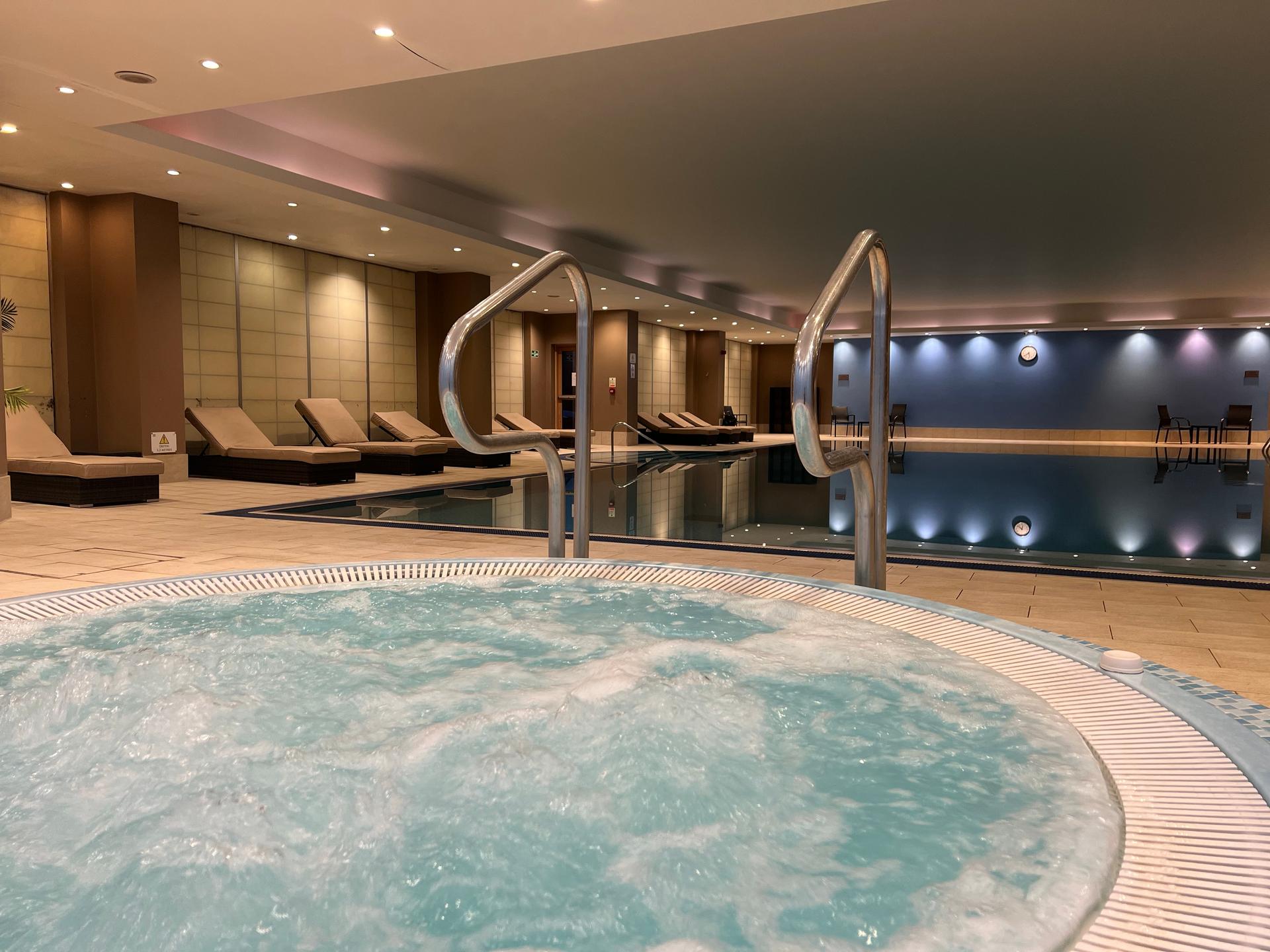Indoor spa with swimming pool and hot tub