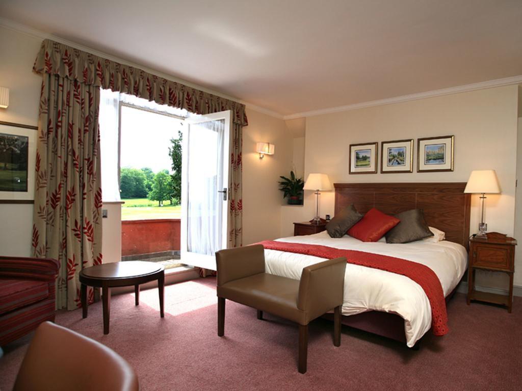 Double bed room with balcony views at Gatton Manor Golf Club