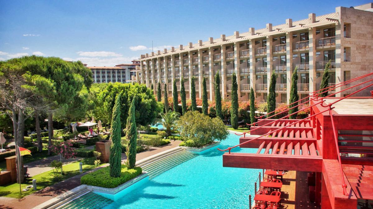Outdoor view of the Gloria Serenity Resort with a view of the swimming pool