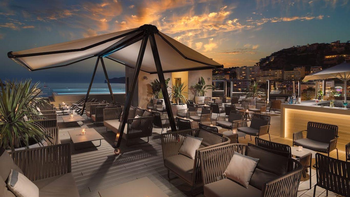 Outdoor lounging area at H10 Casa Del Mar