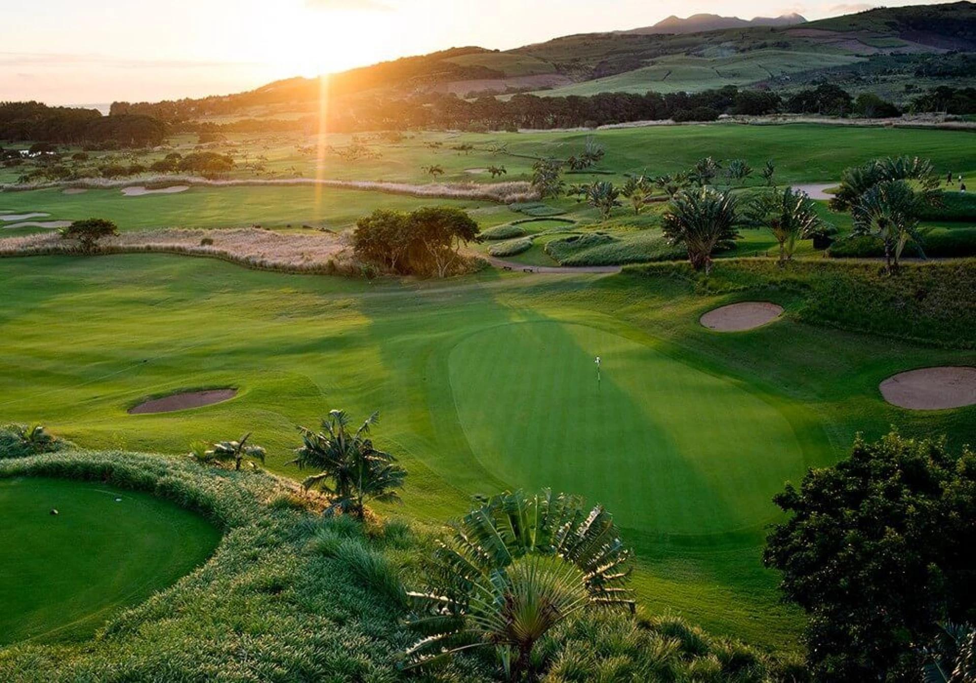 Overhead view of a well maintained fairway nestled with sand bunkers