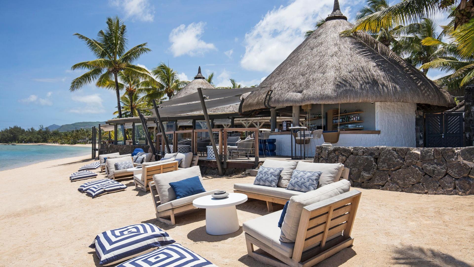 Lounging area on the private beach at Heritage Awali