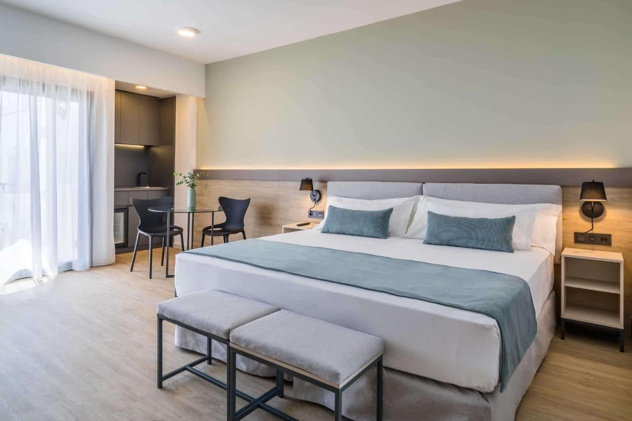Double bed suite at Hotel PYR Marbella with a balcony